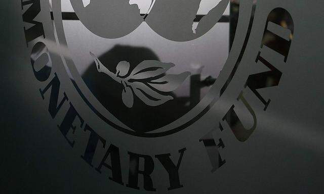 The International Monetary Fund logo is seen during a news conference in Bucharest