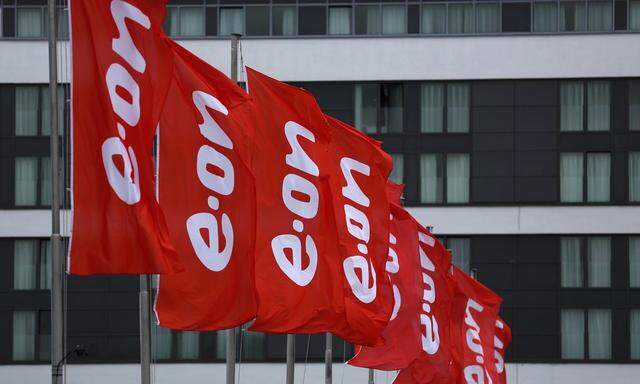 Flags of E.ON are seen before the annual meeting of German utility giant E.ON in Essen