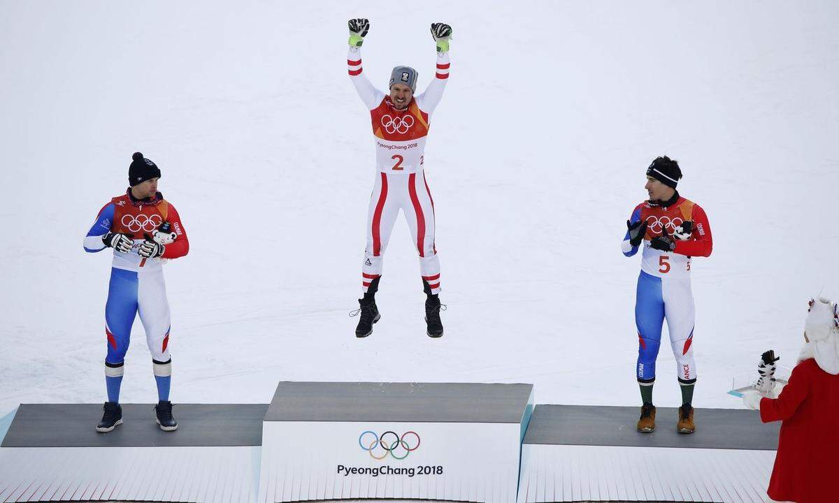 Hirscher und zwei glückliche Franzosen.