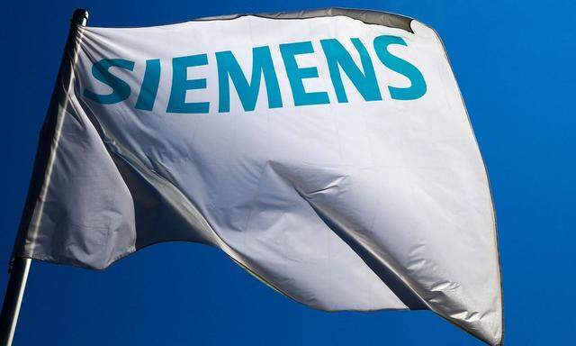 File photo of a flag with the logo of German technology firm Siemens