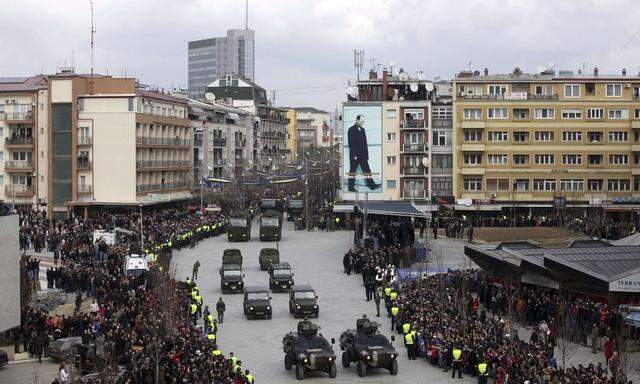 Members of the Kosovo Security Forces march during a celebration marking the fifth anniversary of Kosovo's declared independance from Serbia in Pristina