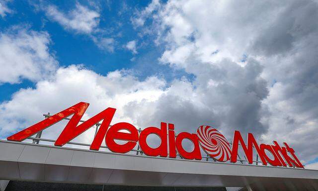 FILE PHOTO: The logo of the electronics retailer Media Markt is seen at the entrance of a shop in Sint-Pieters-Leeuw