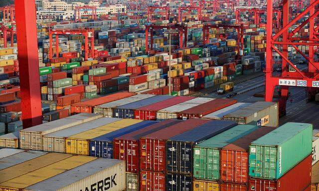 FILE PHOTO: Containers are seen at the Yangshan Deep Water Port part of the Shanghai Free Trade Zone in Shanghai