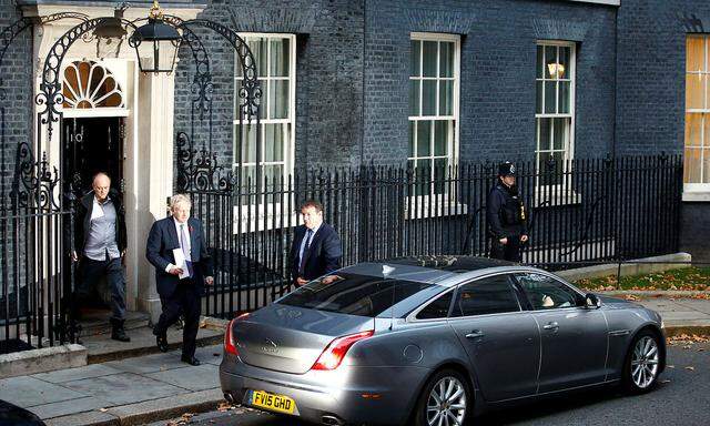Britain's Prime Minister Boris Johnson and Dominic Cummings, special advisor for Britain's Prime Minister leave Downing Street to head for the Houses of Parliament in London