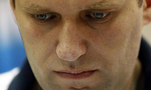 Russian opposition leader and anti-corruption blogger Alexei Navalny attends a court hearing in Kirov