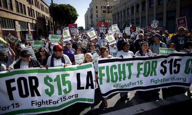 Fast-food workers and their supporters join a nationwide protest for higher wages and union rights in Los Angeles