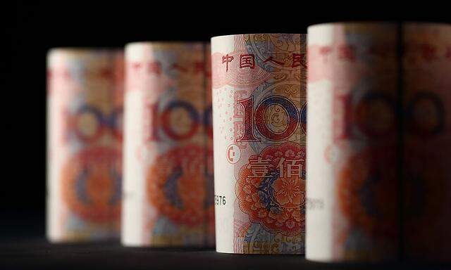 Stocks Boards And Chinese Yuan Banknotes AS China Devalues Yuan by Most in Two Decades