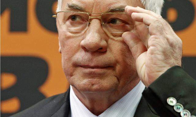Ukraine´s former PM Azarov attends a news conference in Moscow