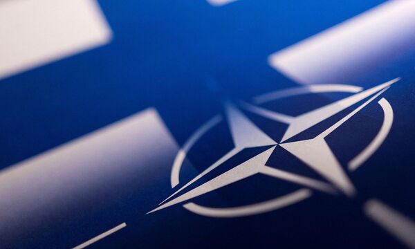 FILE PHOTO: Illustration shows Finnish and NATO flags