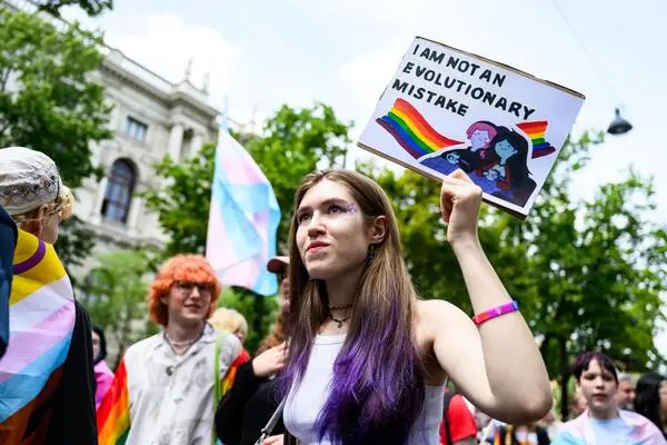 Many of the participants held up signs with messages to underline the demonstration nature of the parade. 