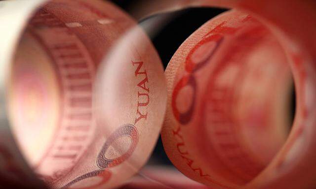Stocks Boards And Chinese Yuan Banknotes AS China Devalues Yuan by Most in Two Decades