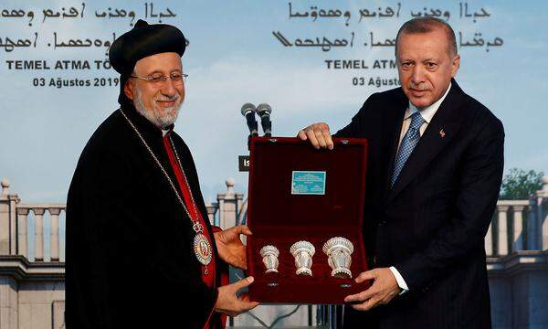 Archivbild aus 2019: Metropolit Yusuf Cetin mit Präsident Erdogan.