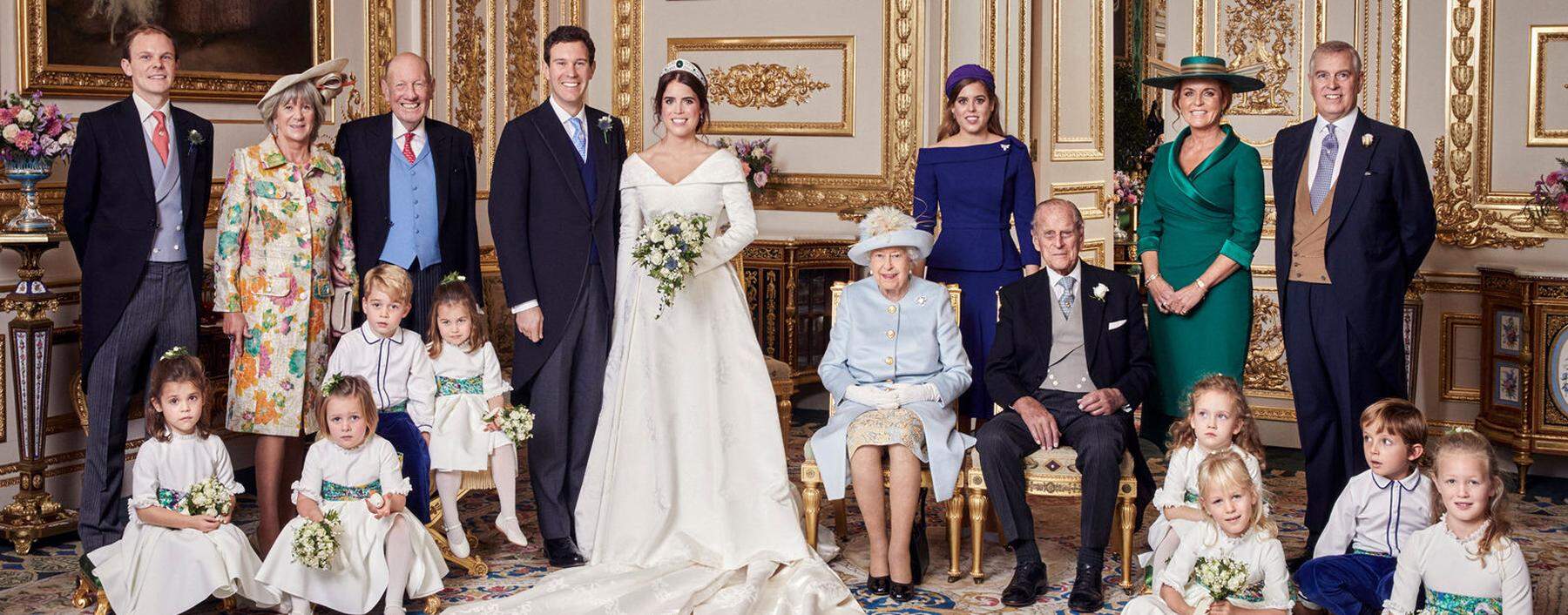 This official wedding photograph released by the Royal Communications shows Princess Eugenie and Jack Brooksbank in the White Drawing Room, Windsor Castle, Windsor