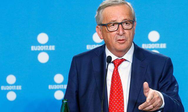 President of the EU Commission Juncker speaks during a news conference in Tallinn