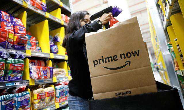 An employee works at Amazon's Prime Now fulfillment centre in Singapore