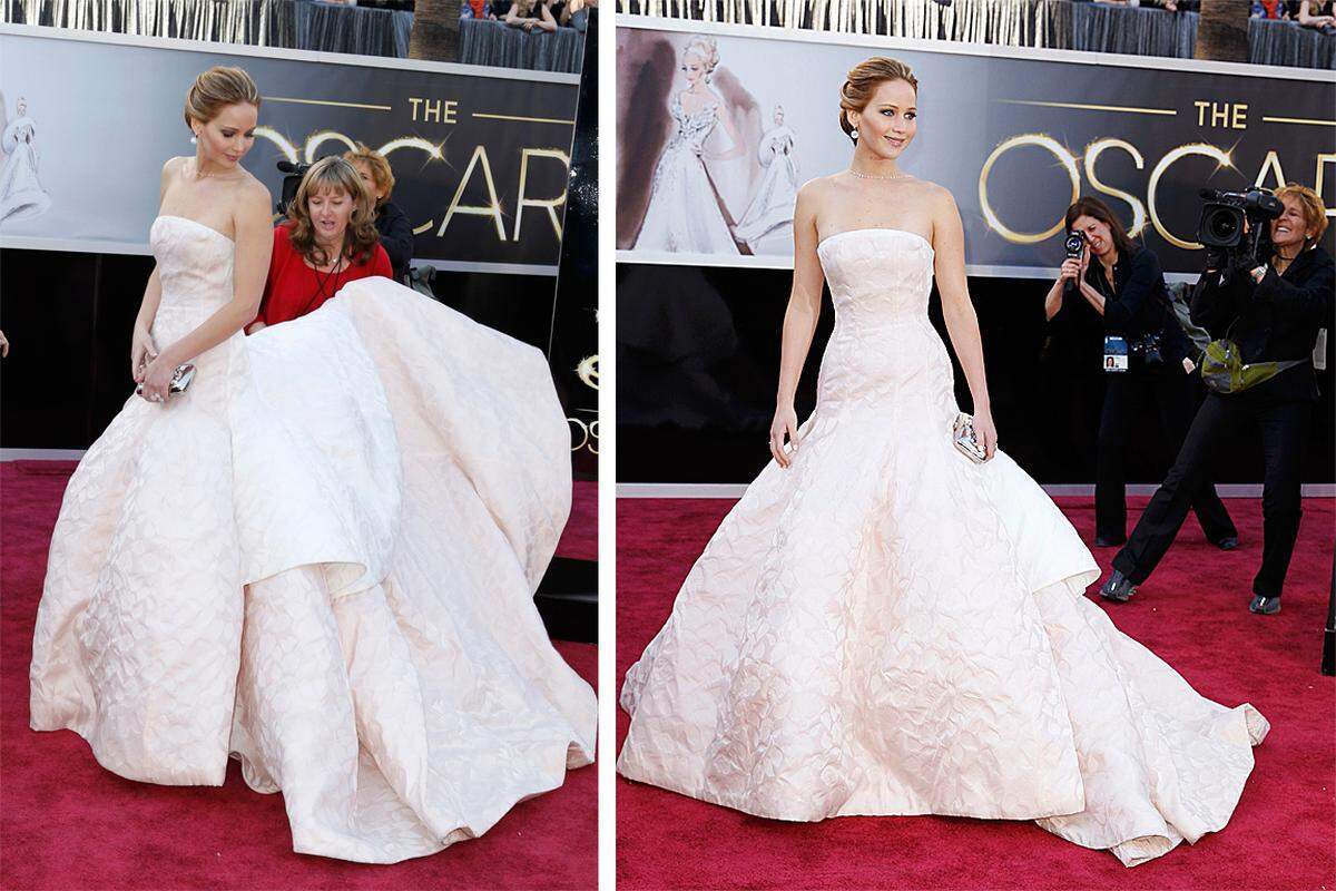Jennifer Lawrence trug ein aufwändiges Kleid, das zurecht gerückt werden musste. Sie wurde ihrer Rolle als Favoritin auf die Hauptdarstellerinnen-Trophäe gerecht. Die 22-Jährige spielte eine junge Witwe in der Liebeskomödie "Silver Linings".