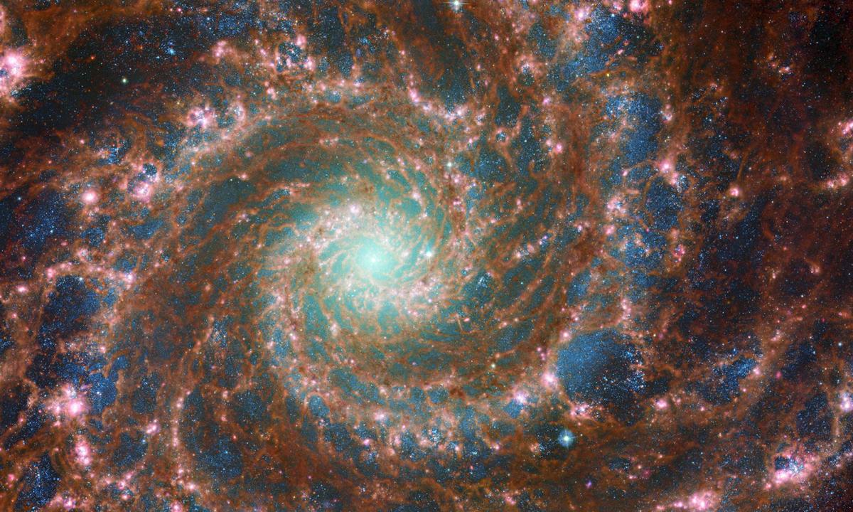 August 30, 2022, Phantom Galaxy, Galaxy, Solar System: M74 shines at its brightest in this combined optical/mid-infrared