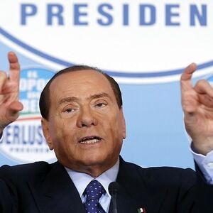 Former Italian Prime Minister Silvio Berlusconi gestures during a news conference at the headquarter of PDL in Rome