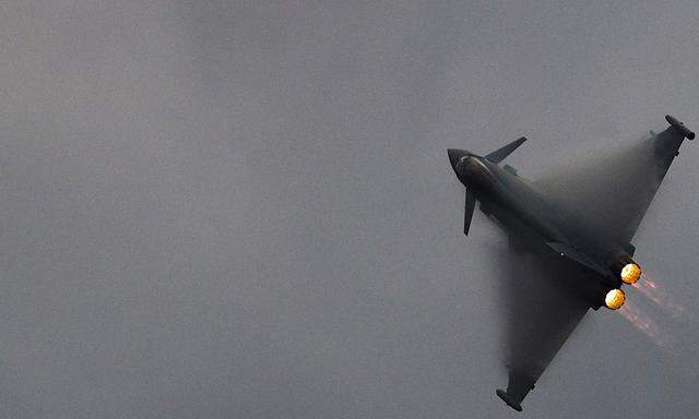 File picture shows an EADS Eurofighter jet performing during an air show in Sion