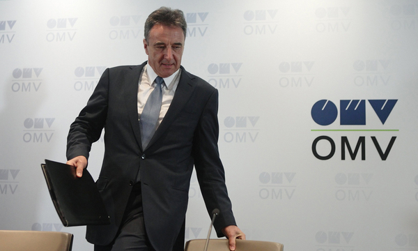 Roiss, chief executive of Austrian oil and gas group OMV, arrives for a news conference in Vienna