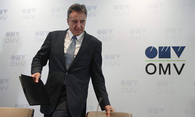 Roiss, chief executive of Austrian oil and gas group OMV, arrives for a news conference in Vienna