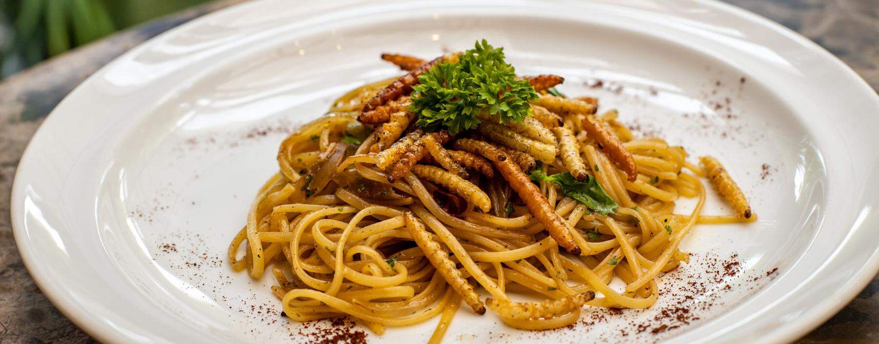spaghetti dish prepared with larvae