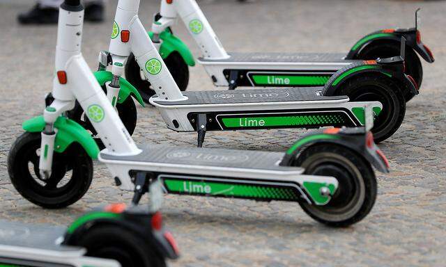 Electric scooters by California-based bicycle rental service Lime are pictured in Berlin