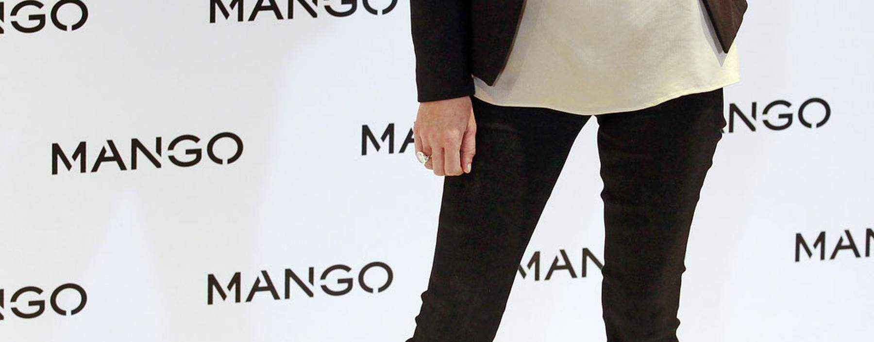 British model Kate Moss poses during the launch of the new Mango 2012 collection in London