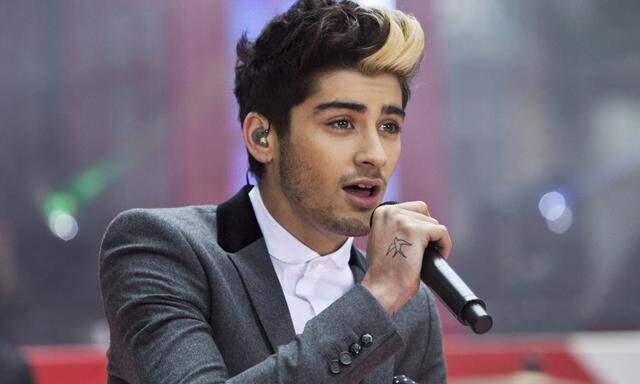 Malik performs with his band, ´One Direction´ on NBC´s Today show in New York