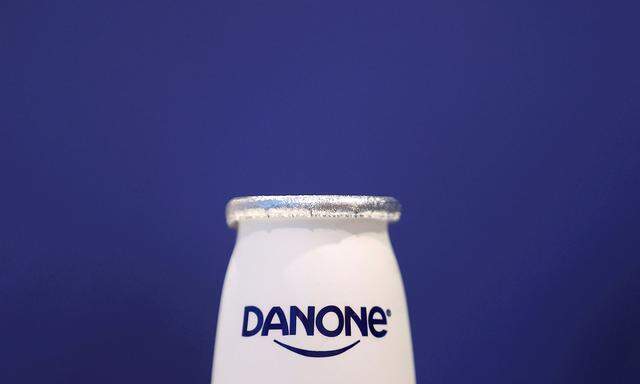 FILE PHOTO: A company logo is seen on a product displayed before French food group Danone's 2019 annual results presentation in Paris