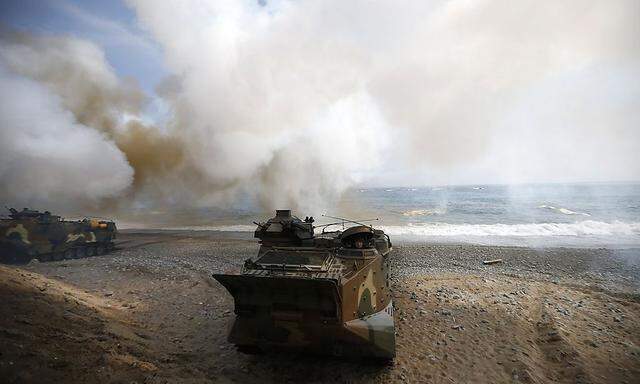 An amphibious assault vehicle of the South Korean Marine Corps arrives on shore during a U.S.-South Korea joint landing operation drill in Pohang