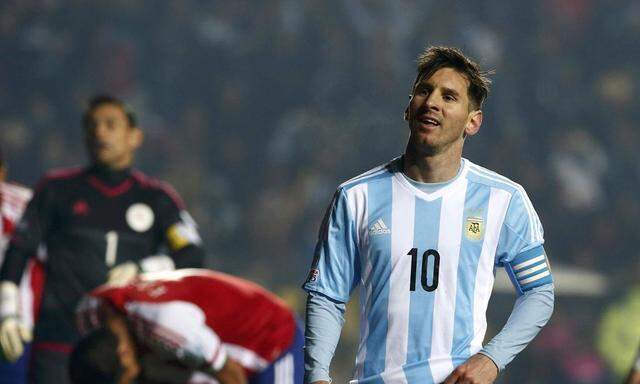 Argentina's Lionel Messi pauses during the Copa America 2015 semi-final soccer match against Paraguay at Estadio Municipal Alcaldesa Ester Roa Rebolledo in Concepcion