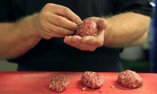 A chef prepares ´Kibbeh´, also known as Syrian meatballs, in the kitchen of the Castro restaurant in Budapest