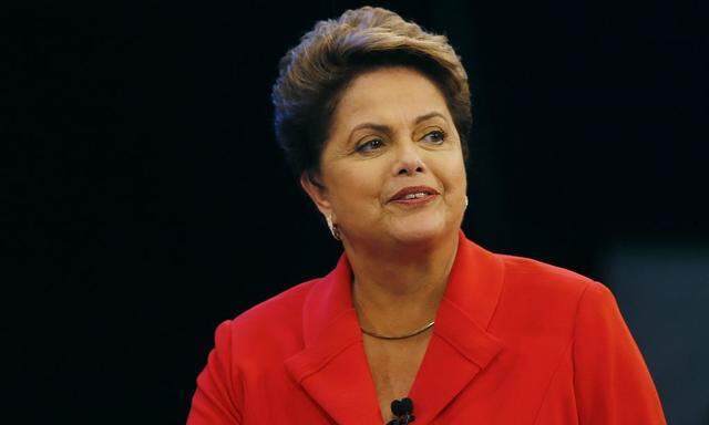 Rousseff of Workers Party arrives to a television debate with Neves of Brazilian Social Democratic Party in Rio de Janeiro