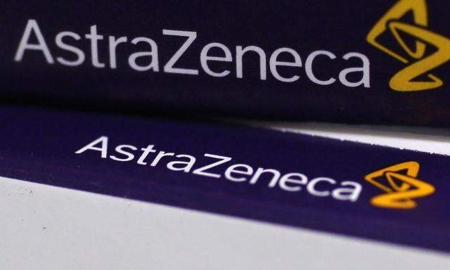 File photograph shows the logo of AstraZeneca on medication packages in a pharmacy in London