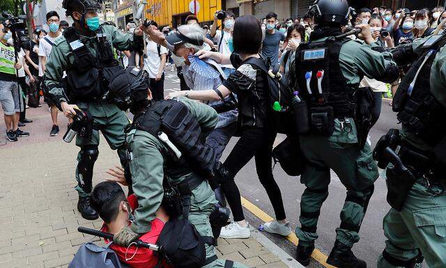 Bilder vom Anti-Regierungsprotest in Hongkong. Die Situation in den USA ermöglicht es China, Kritik daran abzuschmettern.