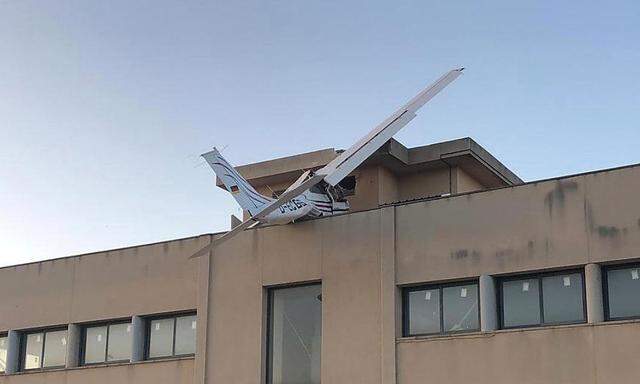 A small plane is seen after it crashed into a building in Badia del Valles, near Barcelona