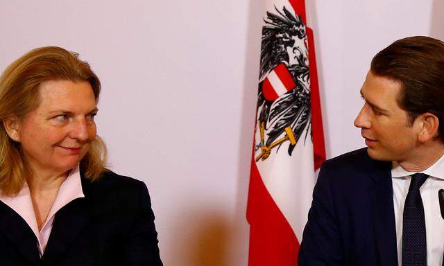 Austrian Foreign Minister Karin Kneissl and Chancellor Sebastian Kurz attend a news conference in Vienna