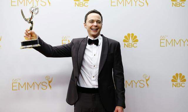 Jim Parsons poses with his Outstanding Lead Actor in a Comedy Series award for the CBS sitcom 'The Big Bang Theory' at the 66th Primetime Emmy Awards in Los Angeles