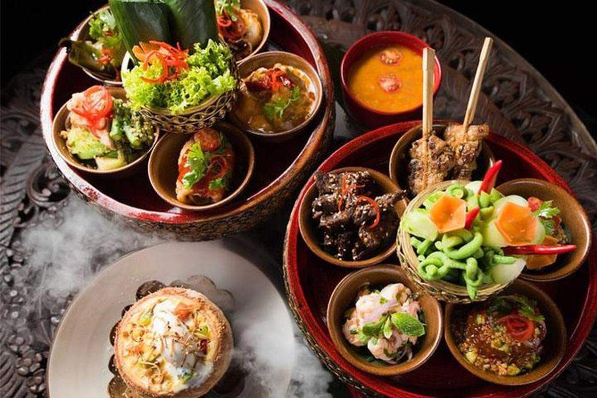 The Khantoke Menu in Chiang Mai is traditionally Northern Thailand oriented, but it is often served with cultural dance and music performances in a festive atmosphere.