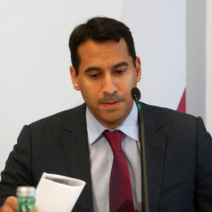 Chief Financial Officer Abuzaakouk and Chief Executive Haynes of U.S.-owned Austrian bank BAWAG PSK prepare for a news conference in Vienna