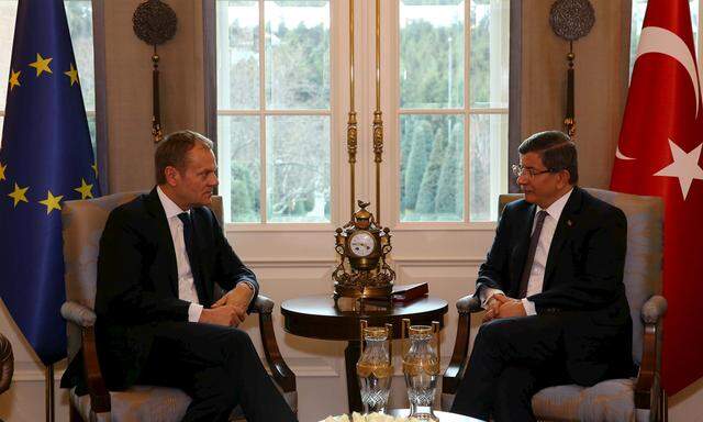 Handout photo of Turkish Prime Minister Davutoglu meeting with European Council President Tusk in Ankara