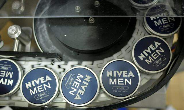 FILE PHOTO: Nivea tins on a Beiersdorf production line in Hamburg