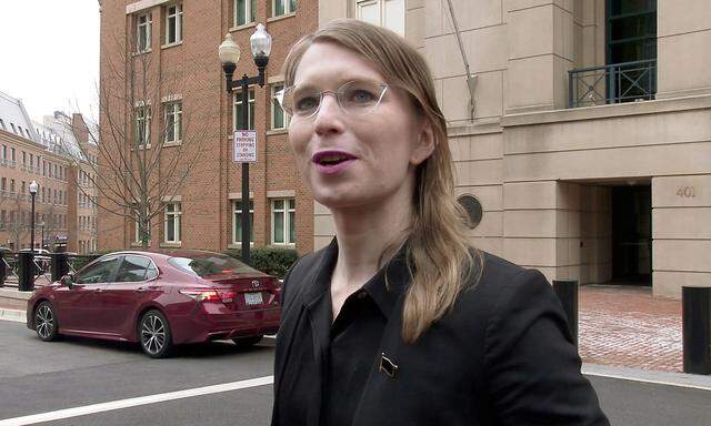 FILE PHOTO: Chelsea Manning speaks to reporters outside the U.S. federal courthouse shortly before appearing before a federal judge and being taken into custody for contempt of court in Alexandria, Virginia