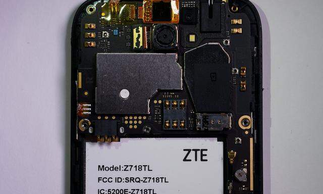 The inside of a ZTE smart phone pictured in photo illustration