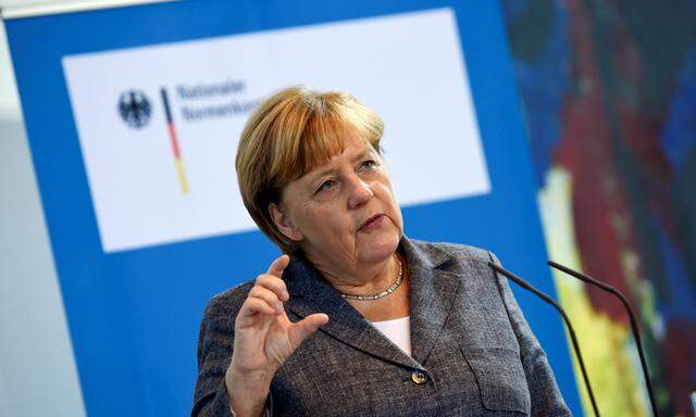 German Chancellor Merkel speaks during a meeting with the National Regulatory Control Council at the Chancellery in Berlin