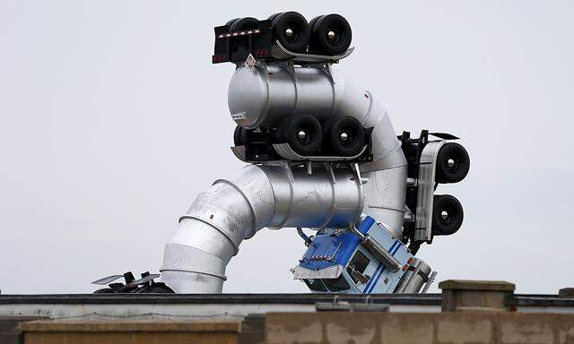 A seaside ´funfair´ sculpture is seen behind a wall in Weston-super-Mare, southwest England