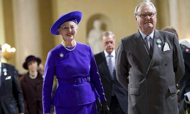 Danish Queen Margrethe and Prince Consort Henrik arrive for the commemoration service in the church in Christiansborg Castle in Copenhagen