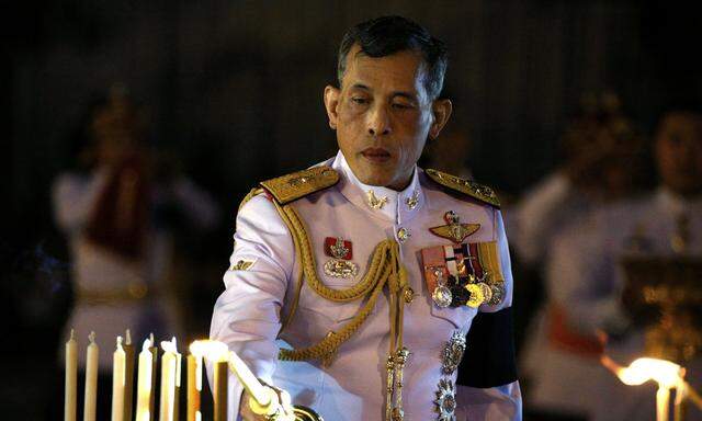 Thailand´s Crown Prince Maha Vajiralongkorn attends an event commemorating the death of King Chulalongkorn, known as King Rama V, as he joins people during the mourning of his father, the late King Bhumibol Adulyadej, at the Royal Plaza in Bangkok