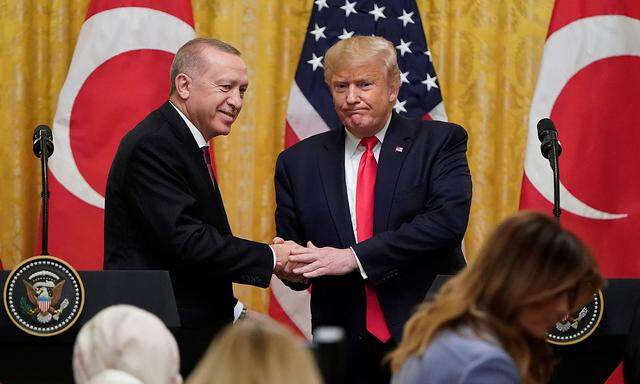U.S. President Donald Trump and Turkey's President Tayyip Erdogan hold a joint news conference at the White House in Washington